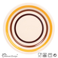 Placa de cena de gres de círculos naranja y marrón